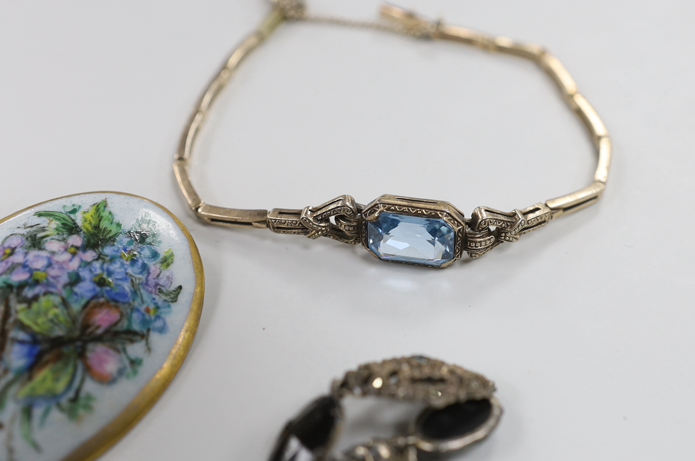 A small group of assorted costume jewellery including marcasite necklace, amethyst paste brooch, bracelet etc.